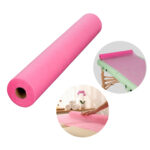 Non-woven rolvel 60 cm geperforeerd roze Habys
